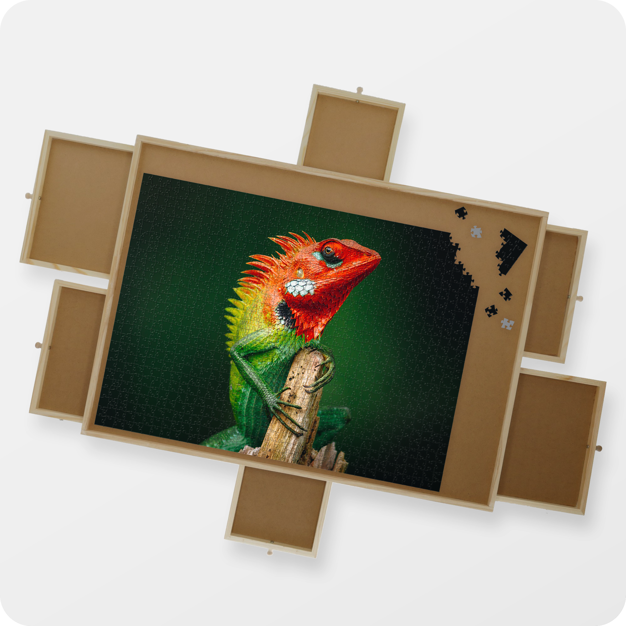 Bovenaanzicht van een puzzelplaat met puzzel van 1000 stukjes erin verwerkt